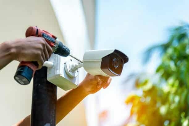 working Security Camera Installation Camera repair service by a technician